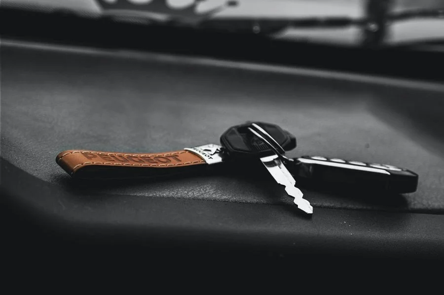 car keys on a black dashboard