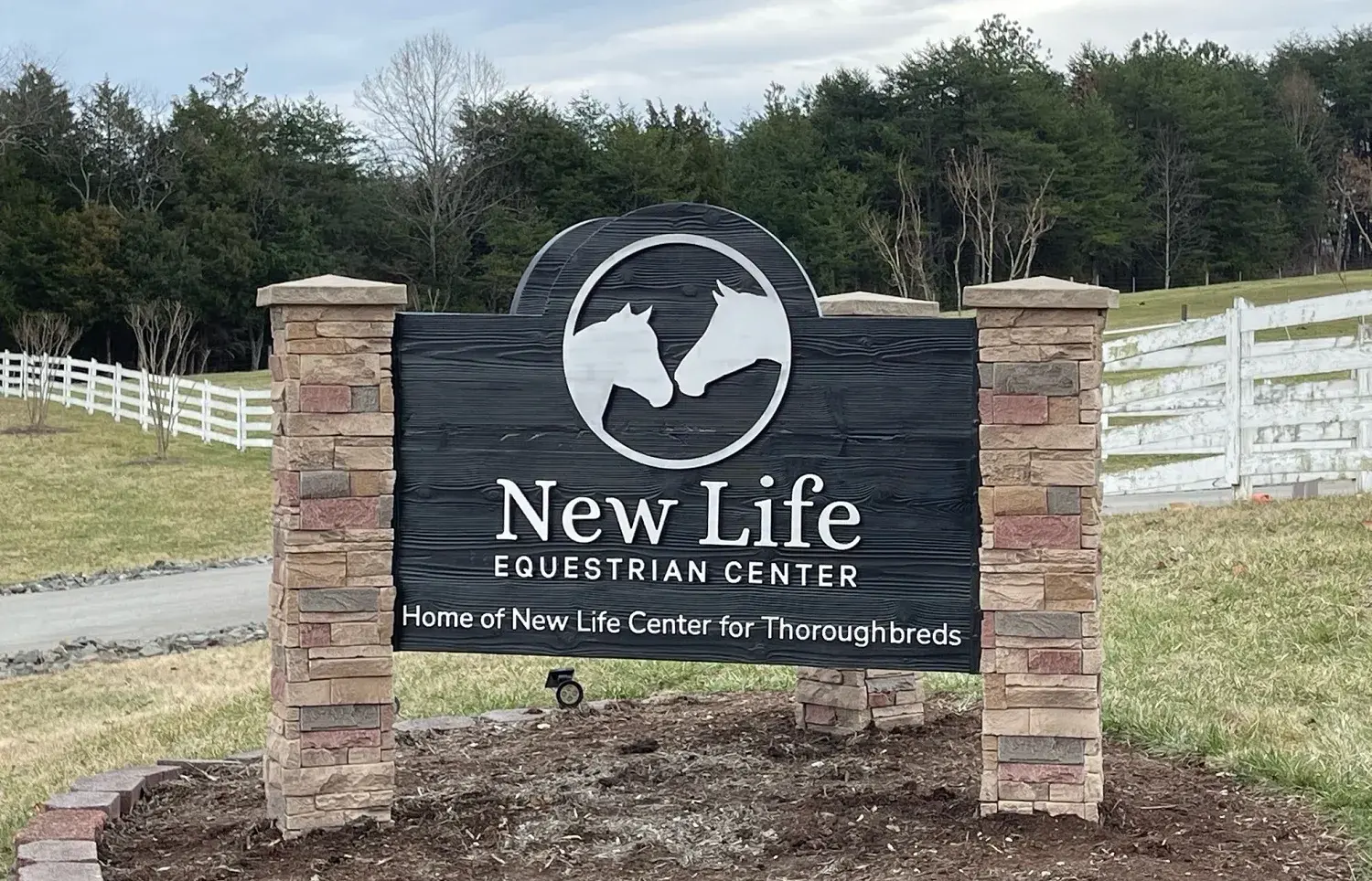 Install faux stone on your restaurant's exterior sign.